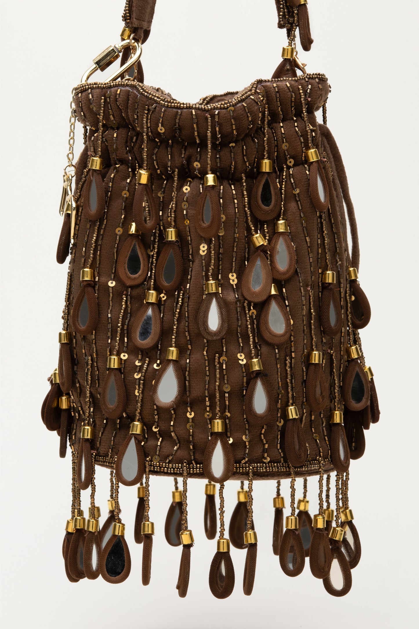 Brown Elio bucket bag with cascading teardrop mirror glass details, sequins, and fringed base, handcrafted Mediterranean statement accessory