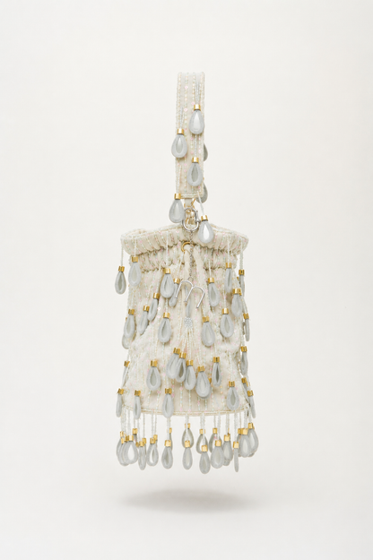 White Elio handcrafted beaded tote with cascading pearlescent drop beads and gold accents, Mediterranean-inspired statement bag