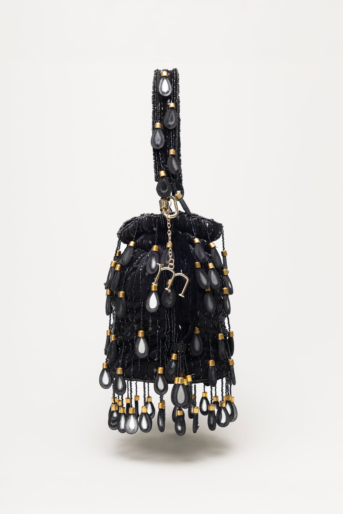 Black Elio velvet bucket bag with obsidian mirror drops, sequins and pearl glass fringe, handcrafted statement accessory