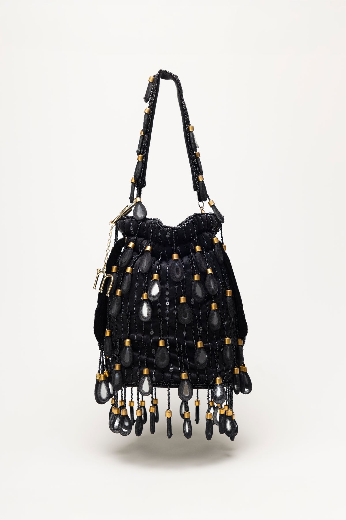 Black Elio velvet bucket bag with obsidian mirror drops, sequins, and pearl-glass fringe handcrafted statement piece