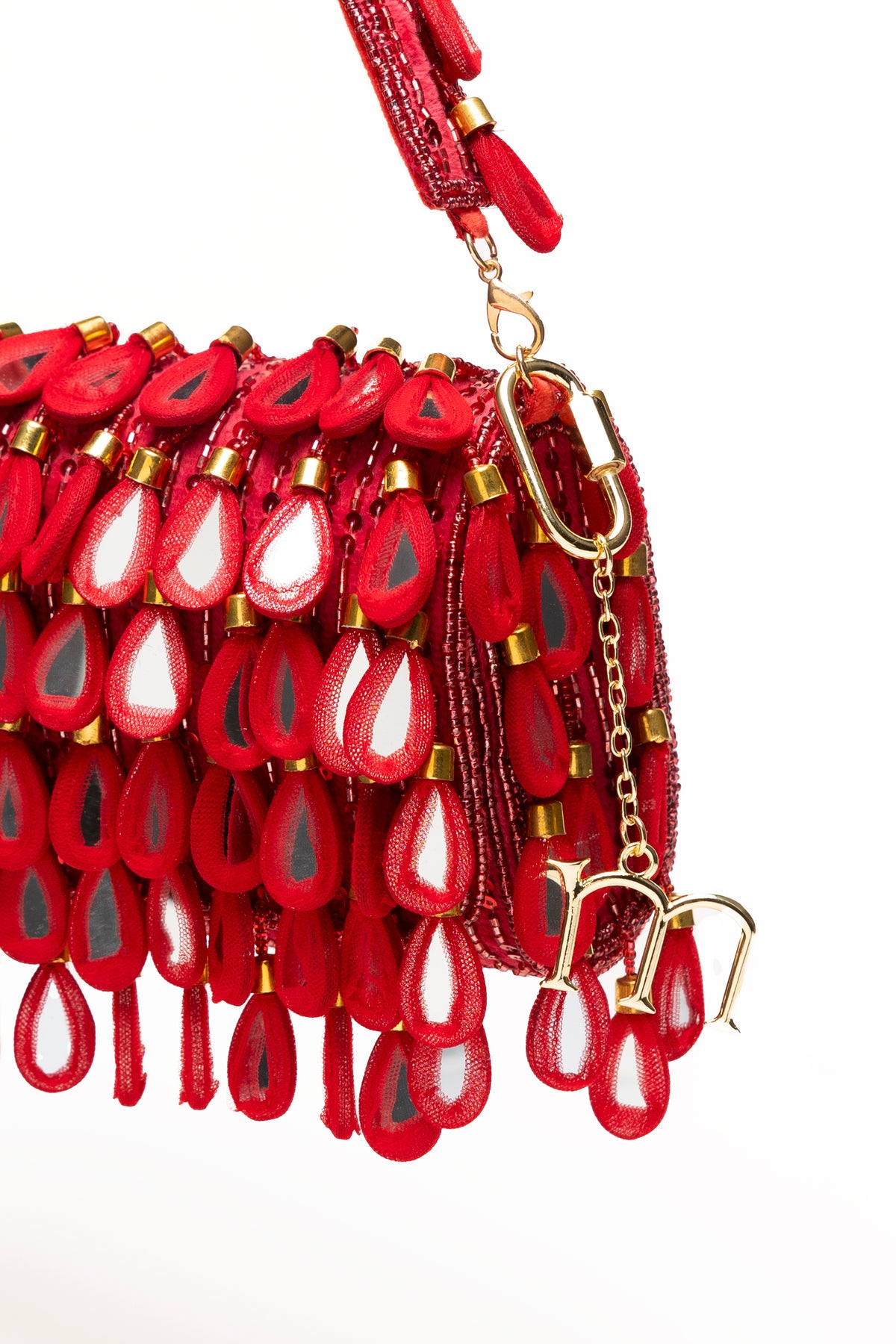 Red Martinas handcrafted sequin bag with layered teardrop mirror pendants, tonal crimson statement accessory