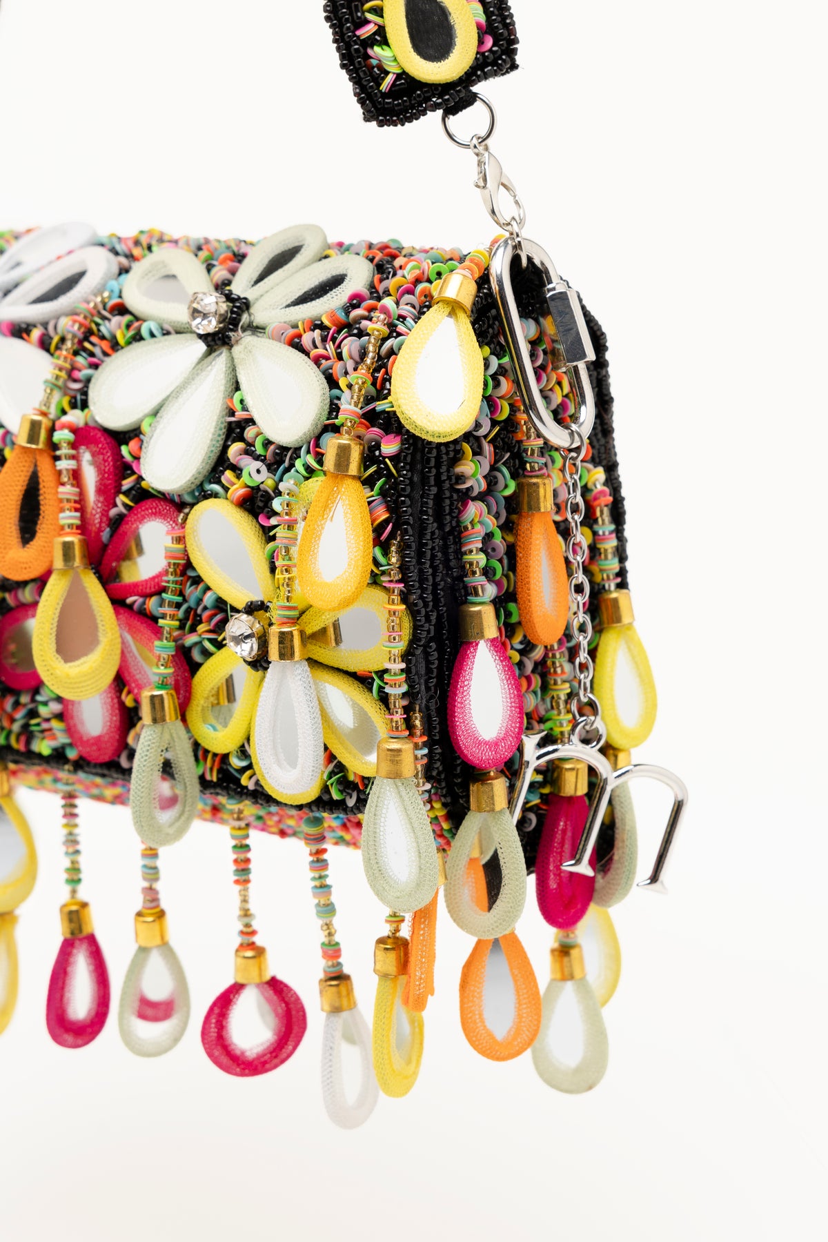 Handcrafted Dark Poppy beaded bag with multicolour micro-embroidery, mirror teardrop pendants in jewel tones and cream, statement island-inspired accessory