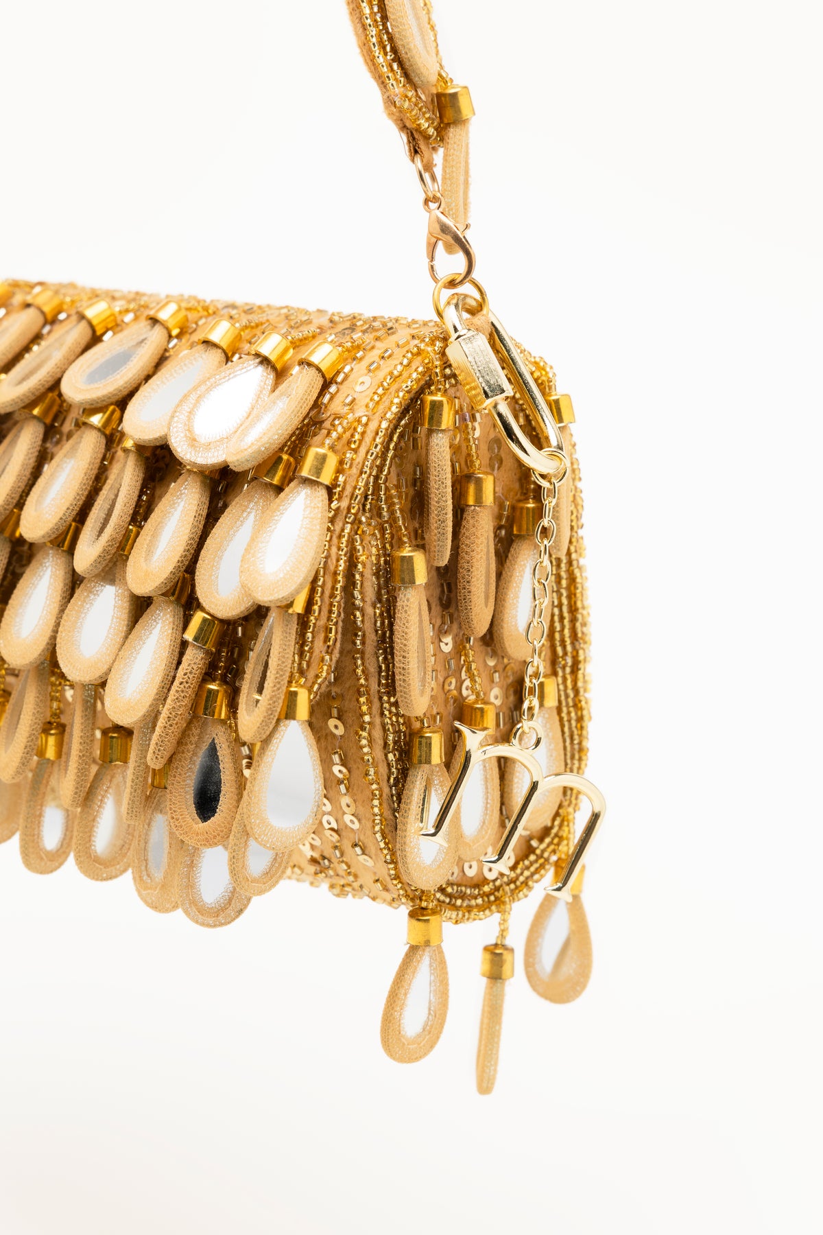 Gold Martinas beaded statement bag with mirror-glass teardrop embellishments in warm gold tones, handcrafted Mediterranean luxury accessory