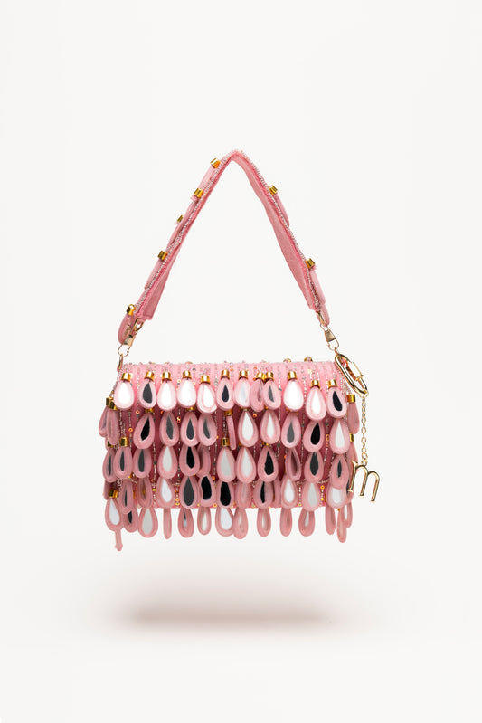 Handcrafted pink beaded shoulder bag with mirrored teardrop pendants in fuchsia and rose tones, sequin base, glitter strap, and gold hardware details