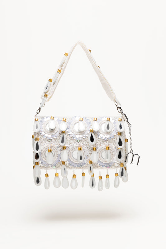 White Vita beaded shoulder bag with circular mirror-glass medallions, crystal embroidery, and cascading teardrop pendants