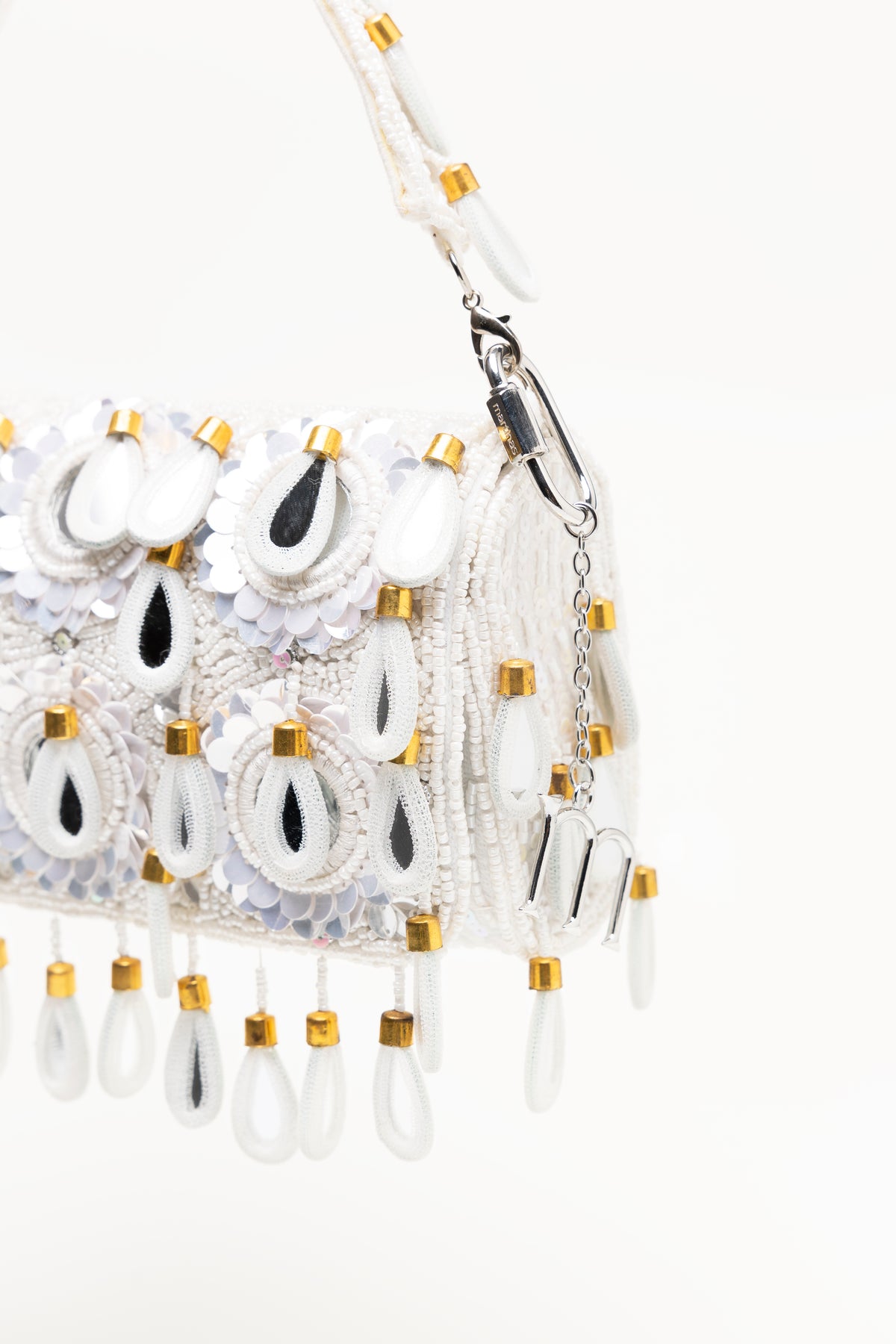White Vita handcrafted beaded bag with mirror-glass medallions, crystal beadwork, and cascading teardrop pendants