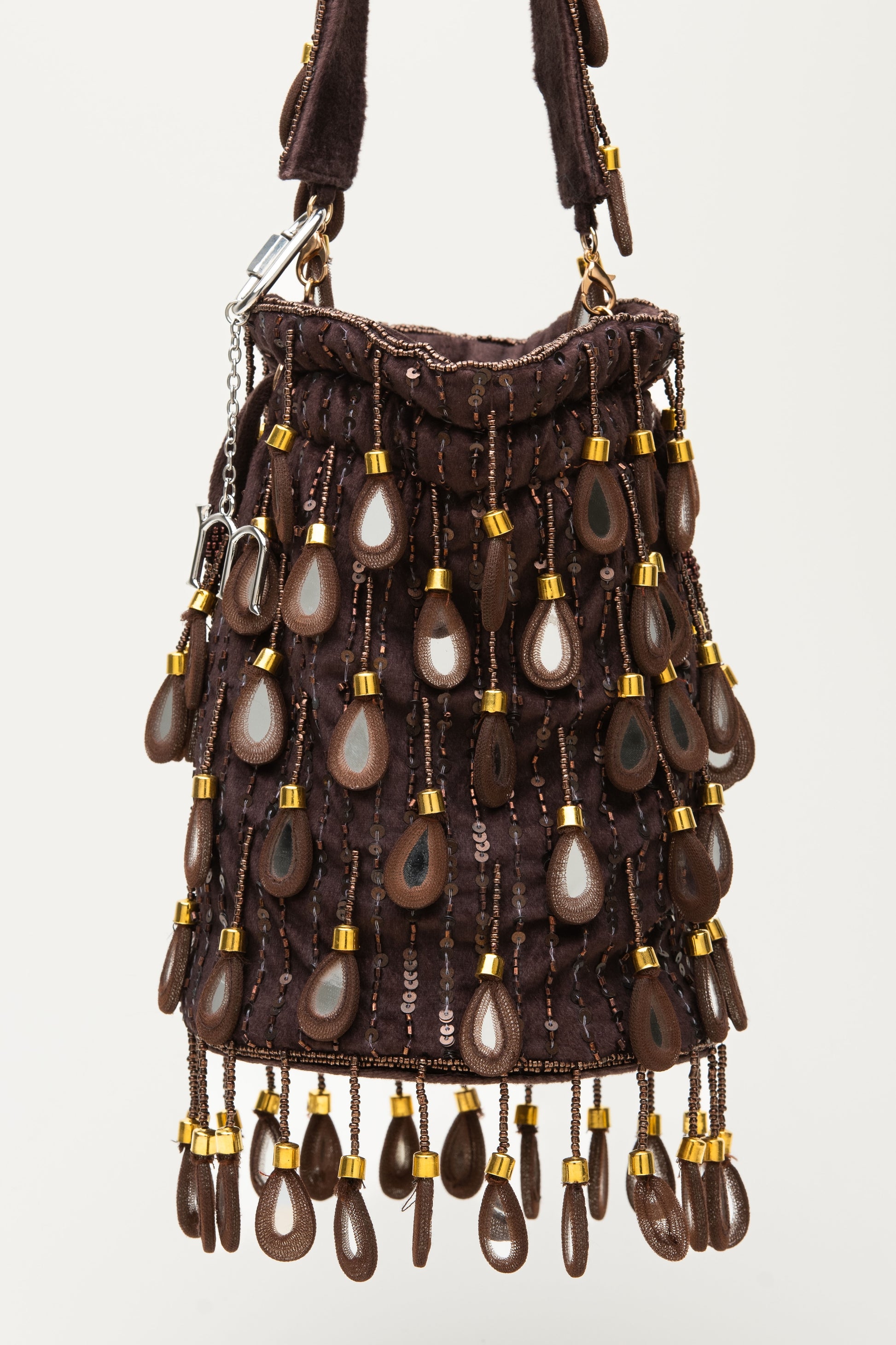 Brown Elio bucket bag with teardrop mirror-glass sequins and cascading fringe details, handcrafted statement accessory