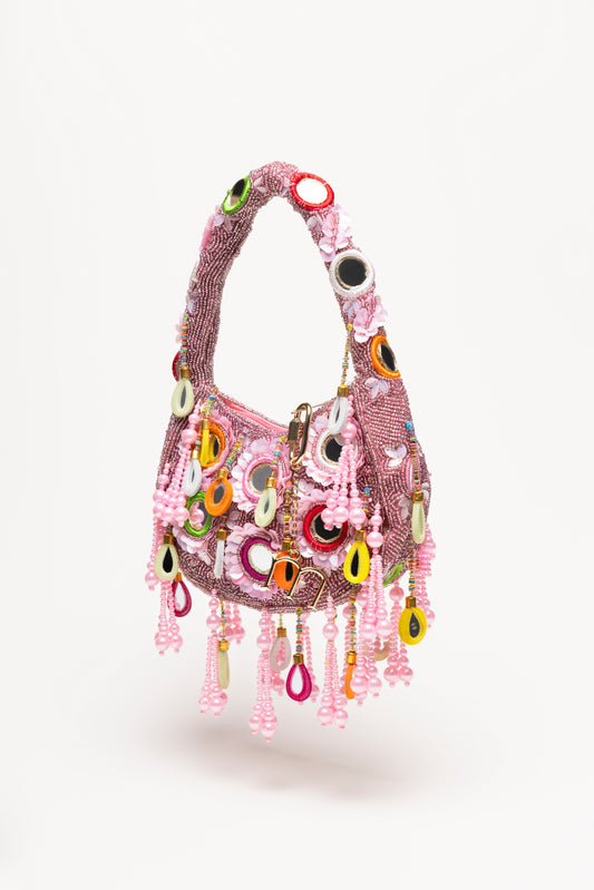 Dusty rose beaded Formentera bag with teardrop pendants, mirror glass details and delicate fringe handcrafted by Martinas