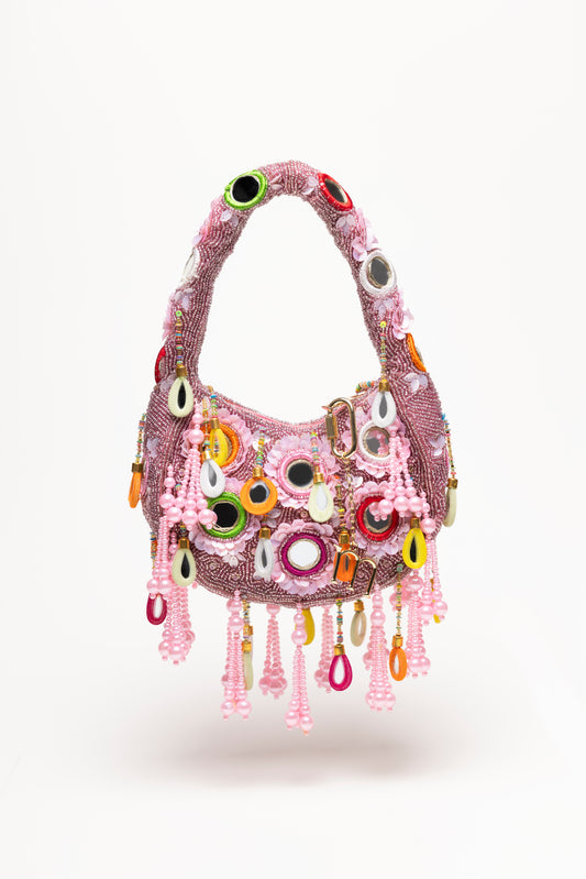 Pink Formentera beaded shoulder bag with micro-bead embroidery, colorful teardrop pendants, and delicate pearl fringe detail
